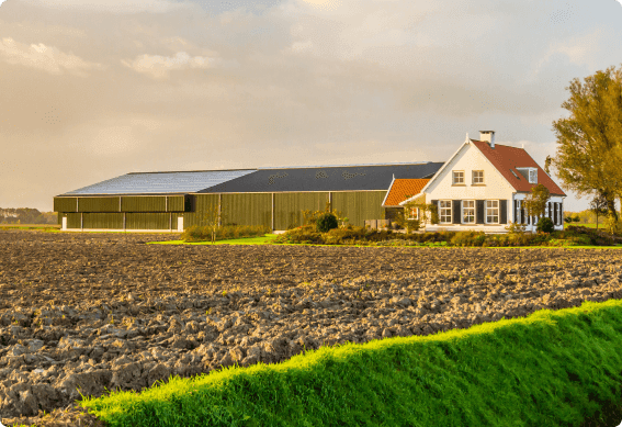 a house with a stone wall